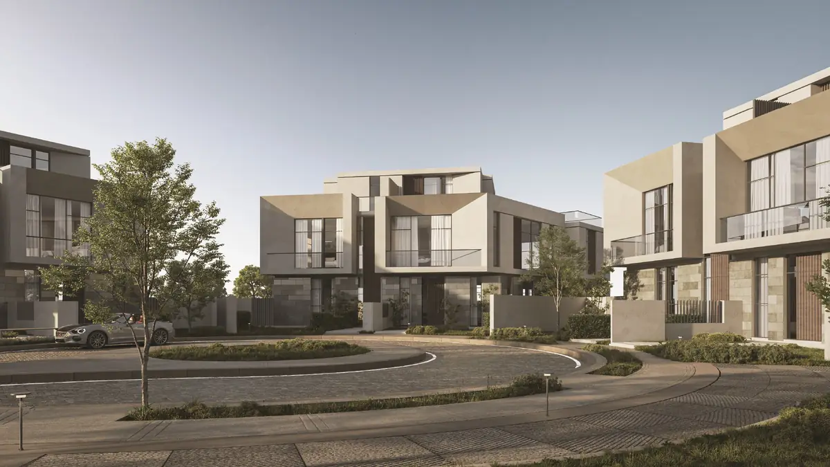 31 West – Townhouses around a landscaped roundabout with glass balconies and stone cladding