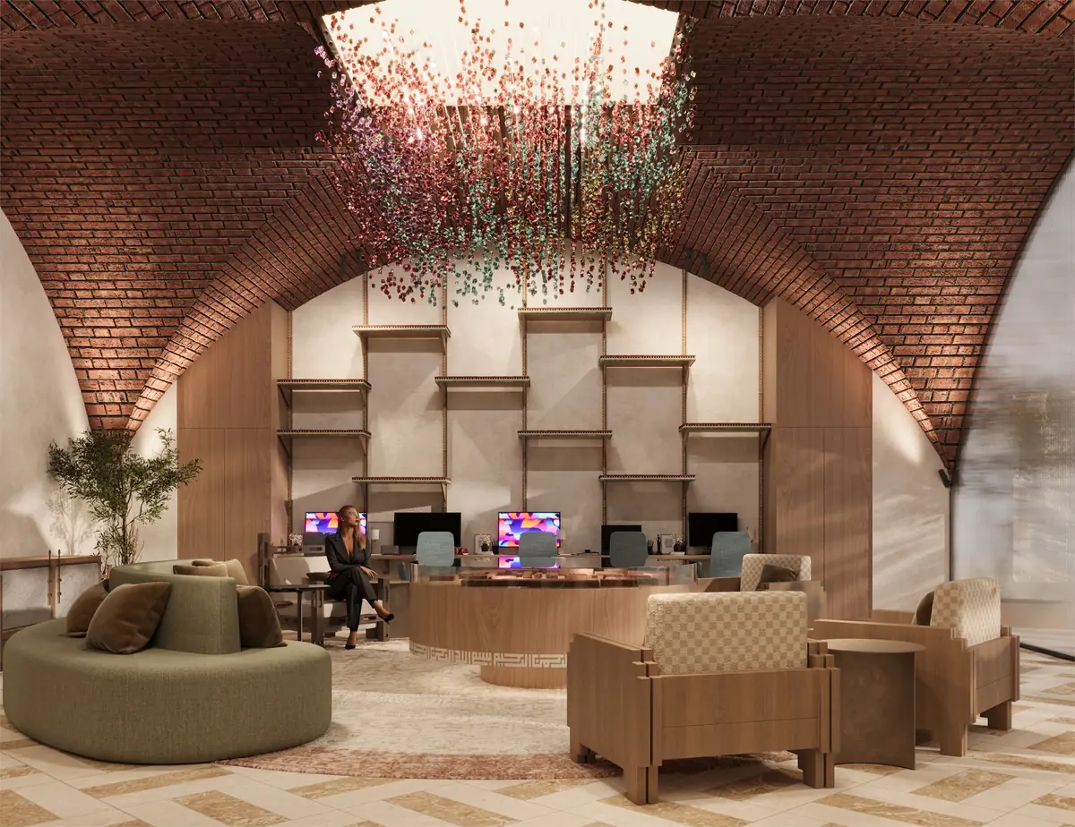 Citadel Plaza Sales Office – محطات عمل ورفوف جدارية خشبية خلف المكتب الدائري مع أريكة خضراء منحنية