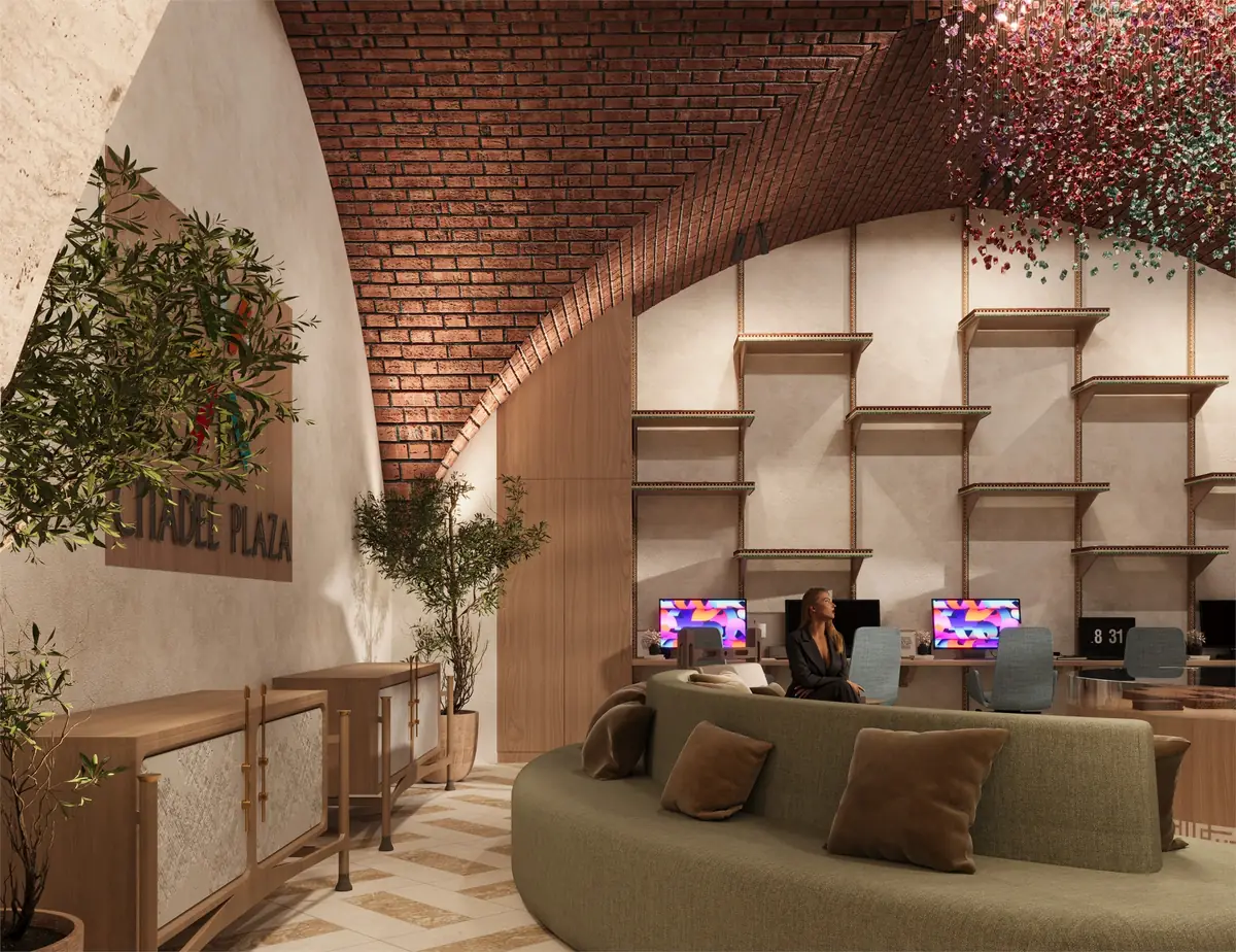 Citadel Plaza Sales Office – أريكة خضراء منحنية تواجه محطات العمل والرفوف أسفل قبو من الطوب