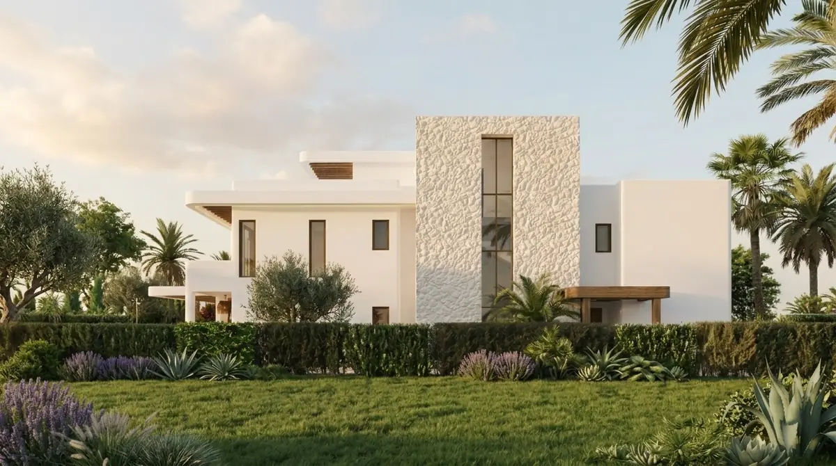Katameya Coast - Sidi Henish – Twin villa elevation with a rough stone tower and slit window behind a hedge