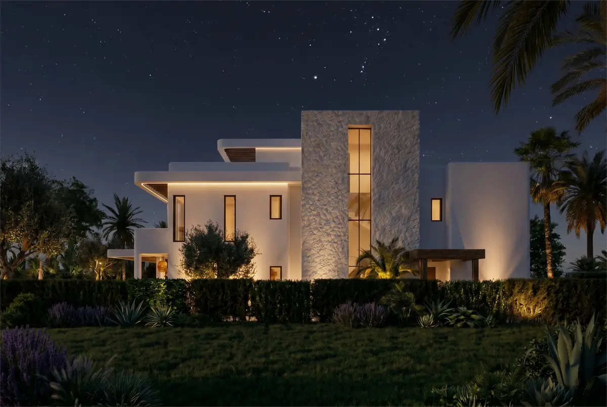 Katameya Coast - Sidi Henish – Twin villa at night with uplit stone tower and glowing windows under stars
