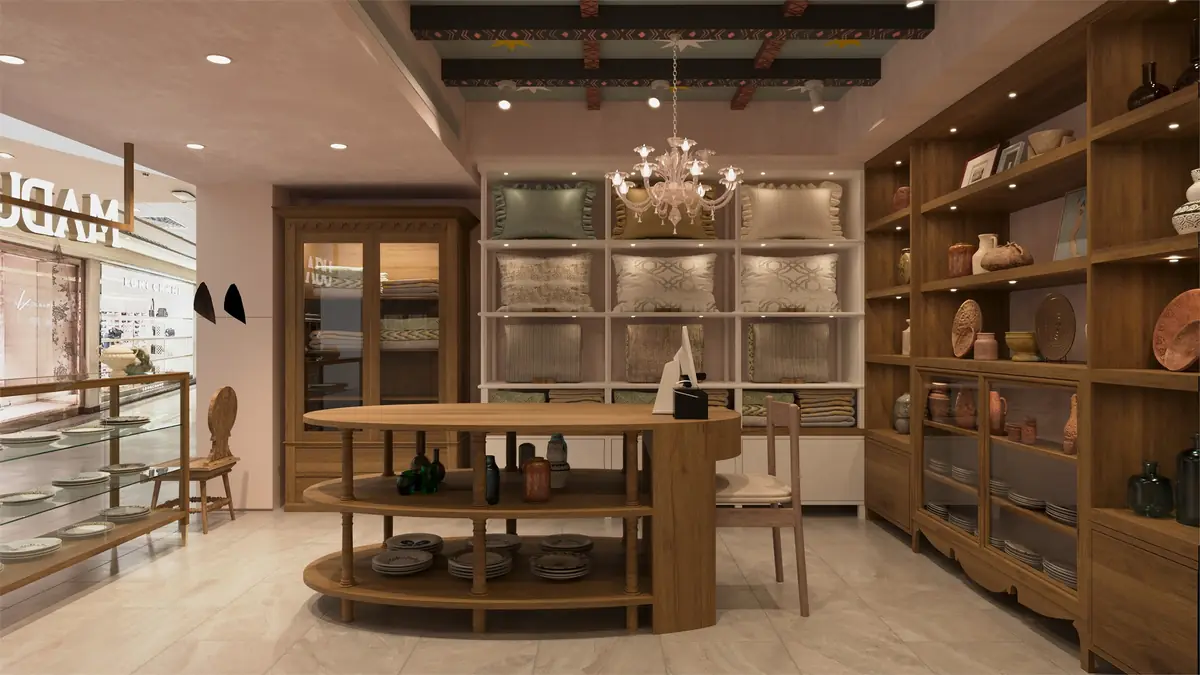 MADU Marriott Zamalek Branch – الجدار الخلفي برفوف الوسائد خلف طاولة بيضاوية وثريا زجاجية